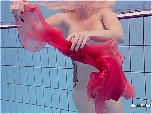 ginger-haired dancing in the pool