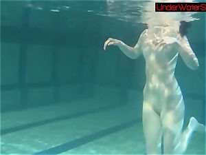 Blackhaired ultra-cutie Irina underwater